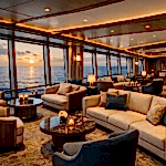 Spacious luxury cruise lounge featuring custom marine furniture designs by CITA Marine.